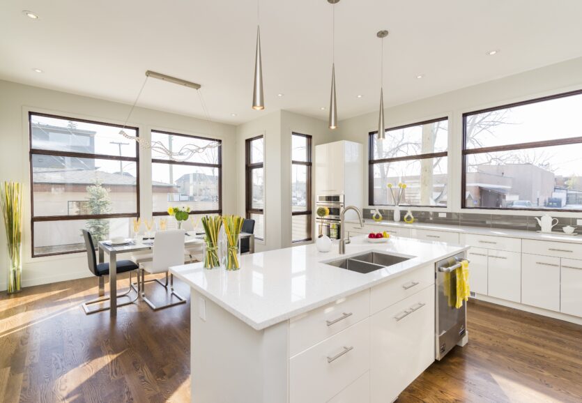 Interior shot of a modern house kitchen with large windows