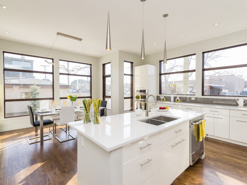 Interior shot of a modern house kitchen with large windows