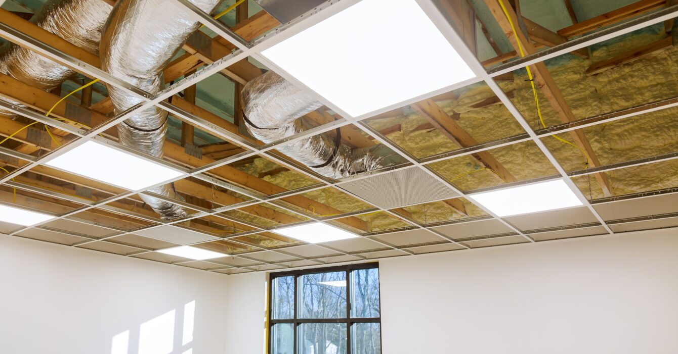 Air conditioning system attached to attic ceiling, foam plastic Insulation of a new home Air conditioning system attached to attic ceiling, foam plastic Insulation of a new home